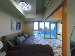 Classic Condo, City View | Iron/ironing board, free WiFi - 35th Uptown Park Suites Tower 2 BGC (Taguig)