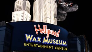 The Hollywood Wax Museum sign with a gorilla figure.