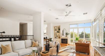 Coastal Retreat – Spacious 4BR Walk to Beach