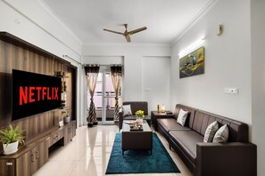 Deluxe appartement, balkon | Woonruimte