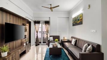 Deluxe Apartment, Balcony | Living area