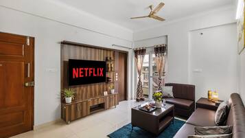 Deluxe Apartment, Balcony | Living area