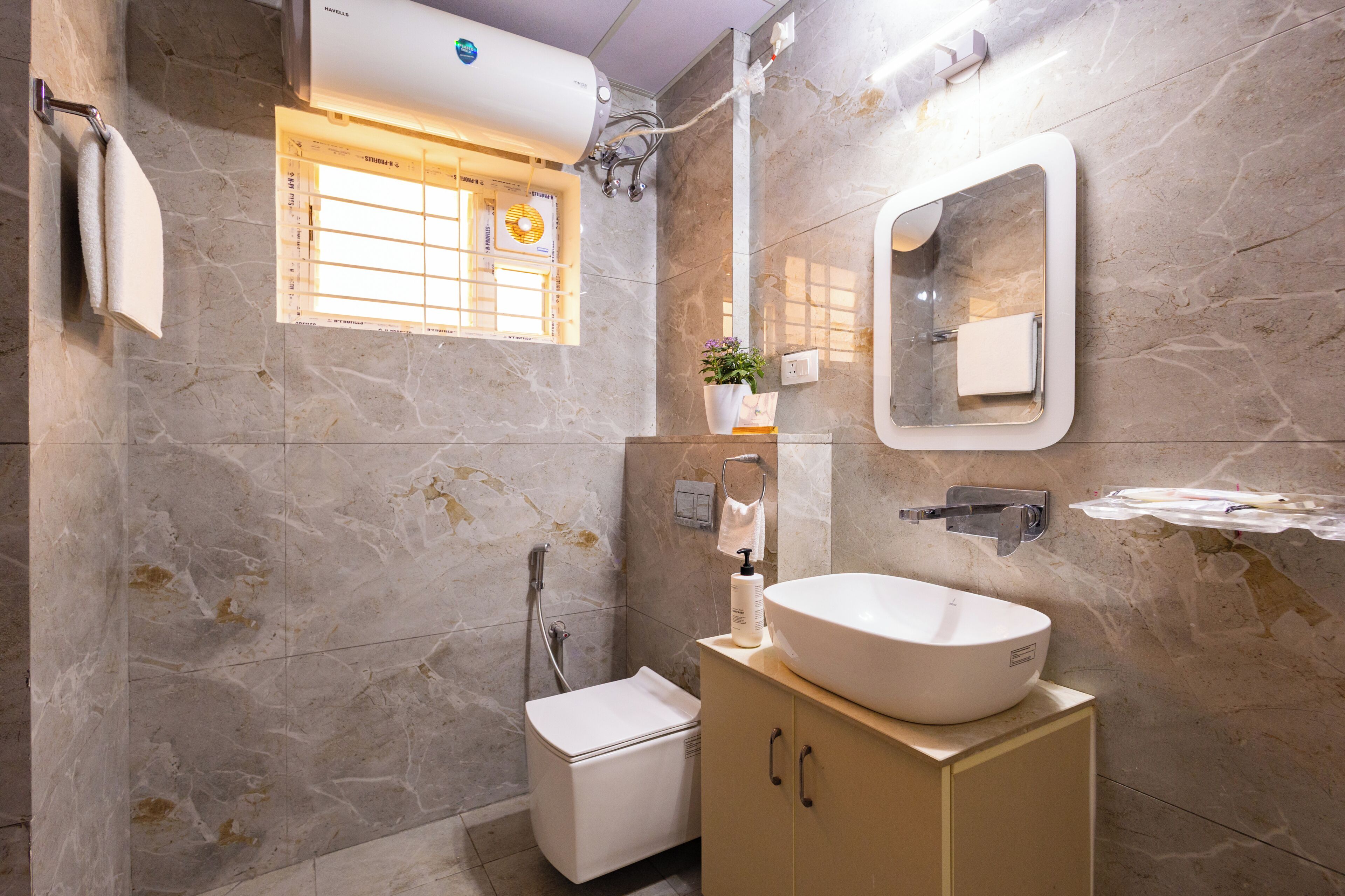 Deluxe appartement, balkon | Badkamer