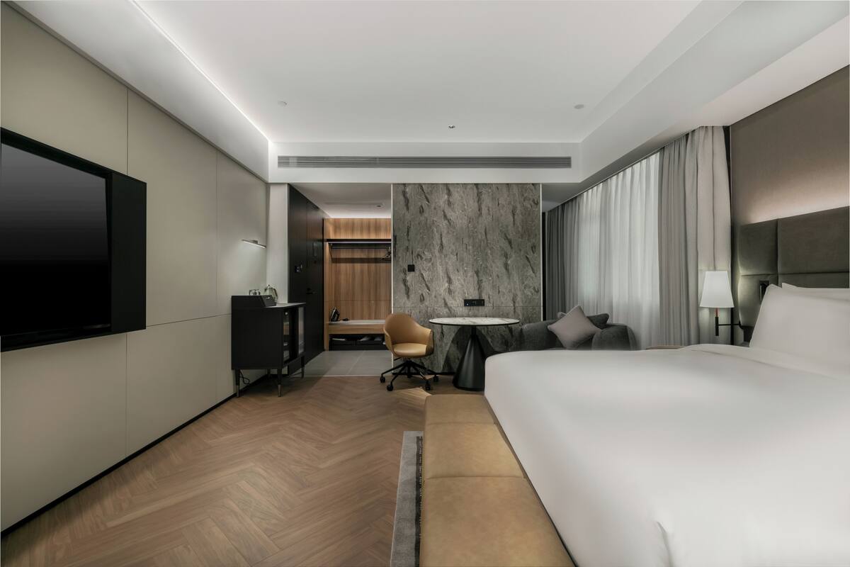 Couette en duvet d'oie, articles gratuits dans le mini-bar, bureau