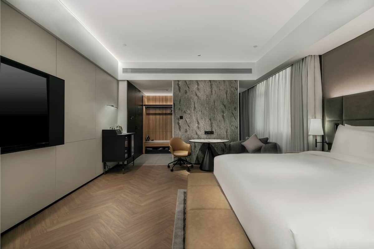 Couette en duvet d'oie, articles gratuits dans le mini-bar, bureau