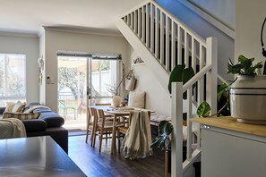 Living area - Water’s Edge: 4BR all-ensuite. Sweeping estuary views for families and groups. (Falcon)