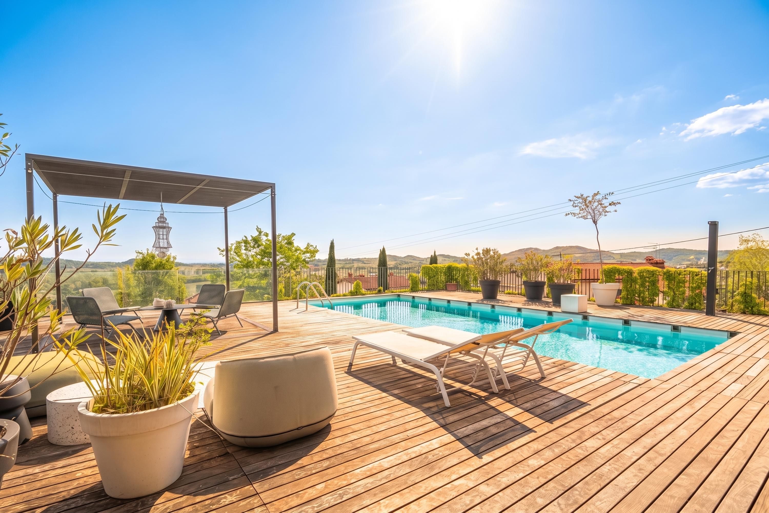 A wooden deck with a swimming pool, lounge chairs, and a pergola.