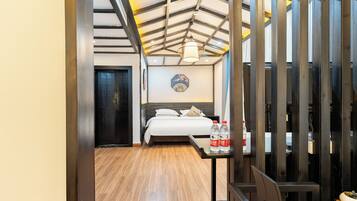 Suite familiar | Cortinas blackout, tabla de planchar con plancha y wifi gratis