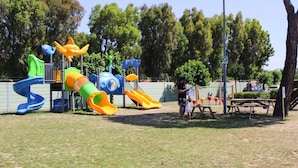 A playground with slides and climbing structures. - Villa in Cecina Mare Near Sandy Beach (Cecina)