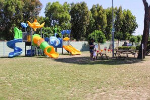 A playground with slides and climbing structures. - Villa in Cecina Mare Near Sandy Beach (Cecina)