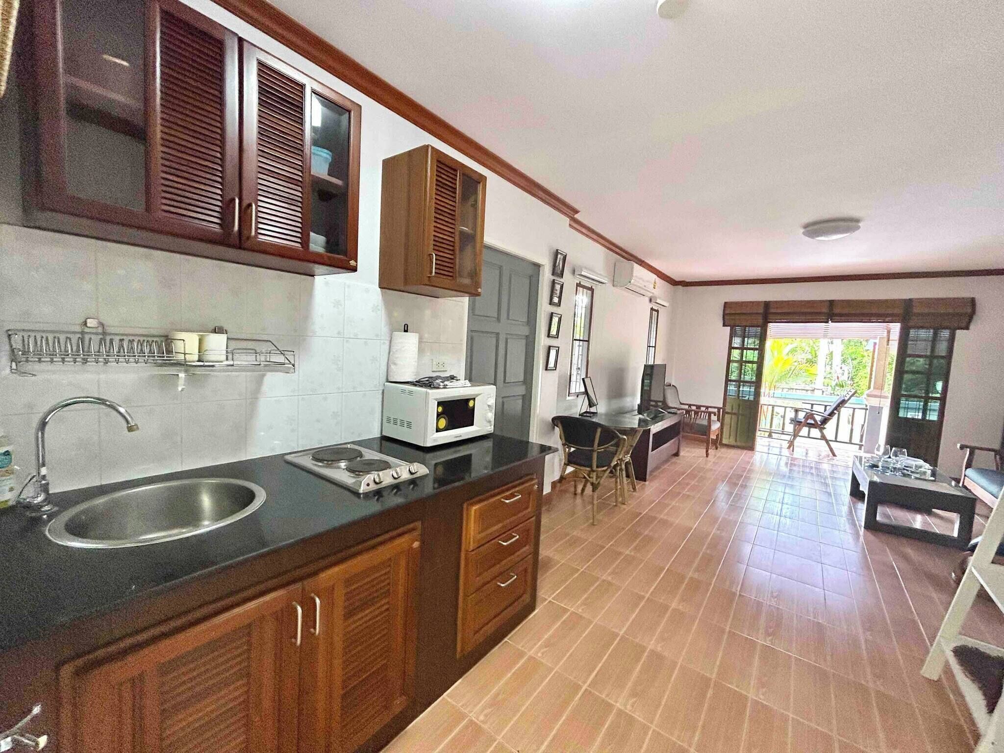 Fridge, microwave, stovetop, coffee/tea maker