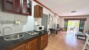 Fridge, microwave, stovetop, coffee/tea maker