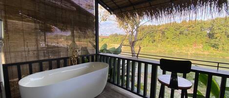 Family Triple Room, Balcony, River View | Property grounds