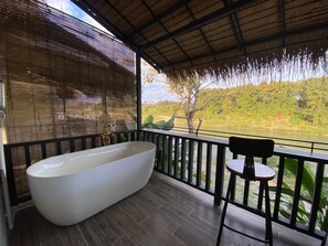 Family Triple Room, Balcony, River View | Property grounds - Namkhan Revora Resort (Luang Prabang)