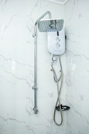 Shower, towels, soap, toilet paper - CozyUrbanHomes-Elegant 2 Bedroom Family Apartment (Nakuru)