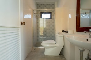 Shower, hair dryer, towels, soap