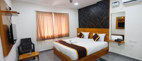 Habitación Deluxe | Minibar, wifi gratis y ropa de cama