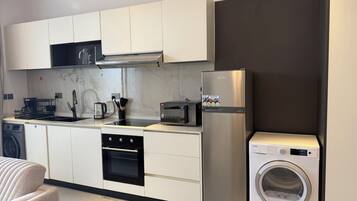 Suite estudio Confort | Cocina privada