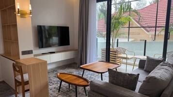 Suite estudio clásica | Área de sala de estar