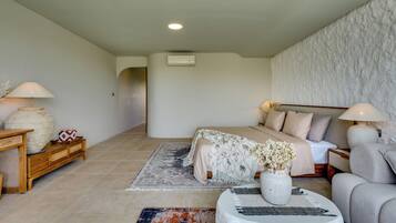 Deluxe Suite, Pool View | In-room safe, iron/ironing board, free WiFi