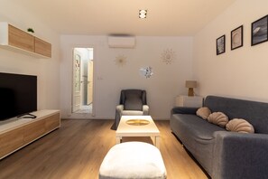 Living area - Global Vacacional: Stylish duplex in Puerto de Sagunto (Puerto de Sagunto)