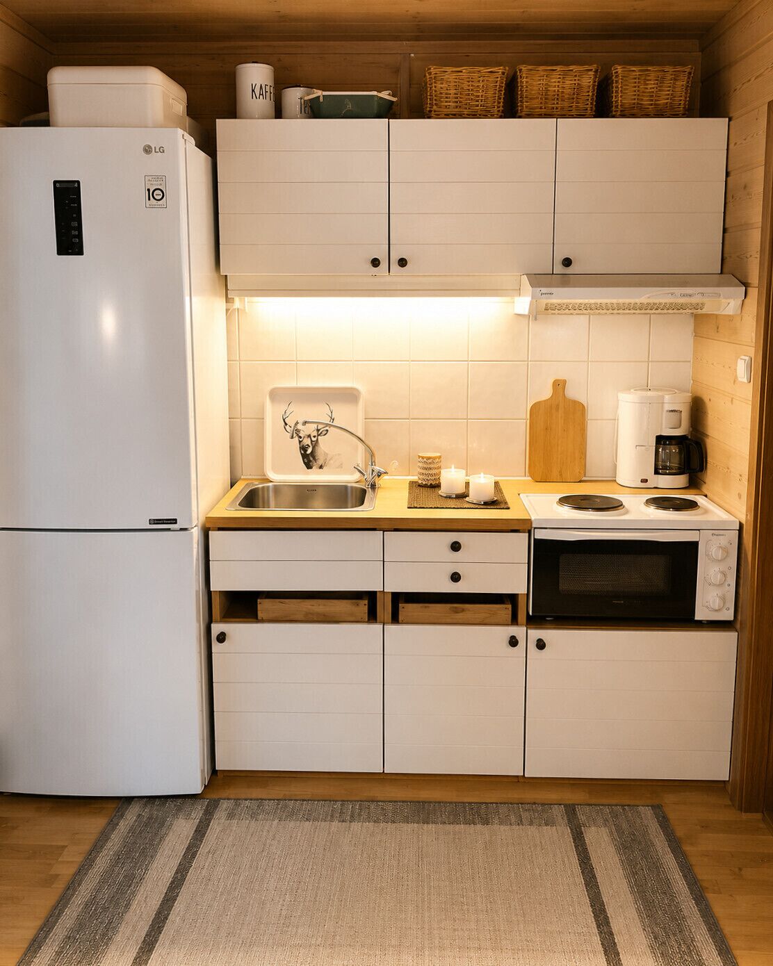 Fridge, oven, coffee/tea maker, cookware/dishes/utensils