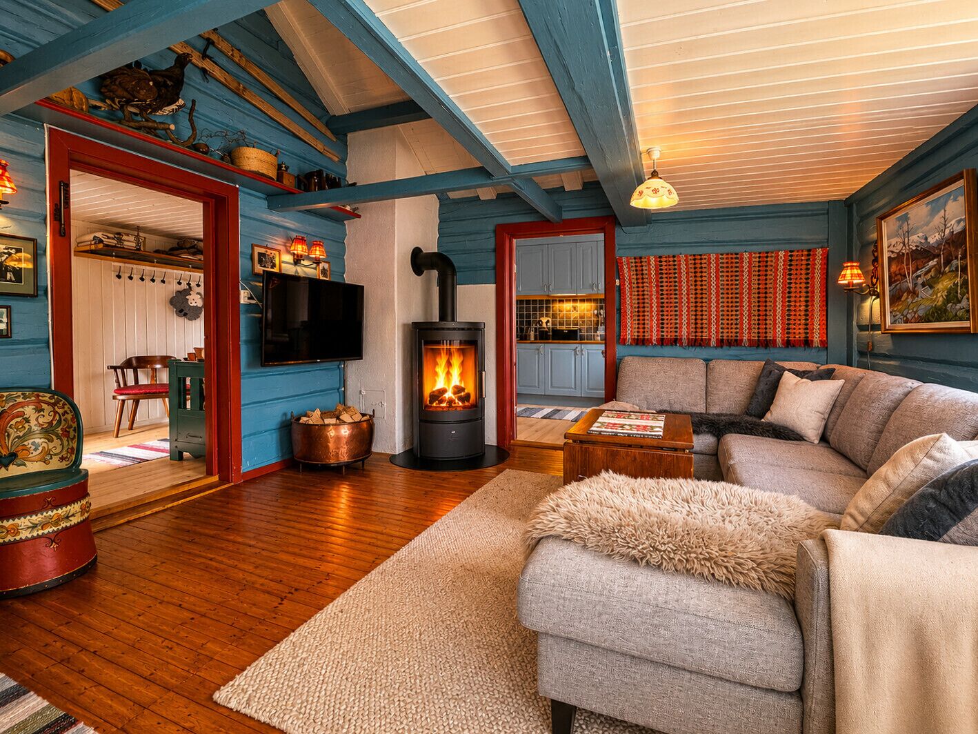 Traditional charming norwegian log cabin with relaxing seating area near the fireplace