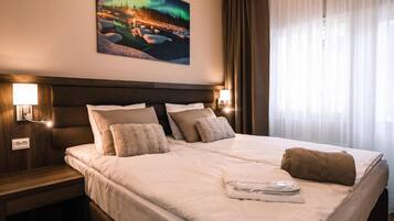 Blackout drapes, soundproofing, free WiFi, bed sheets