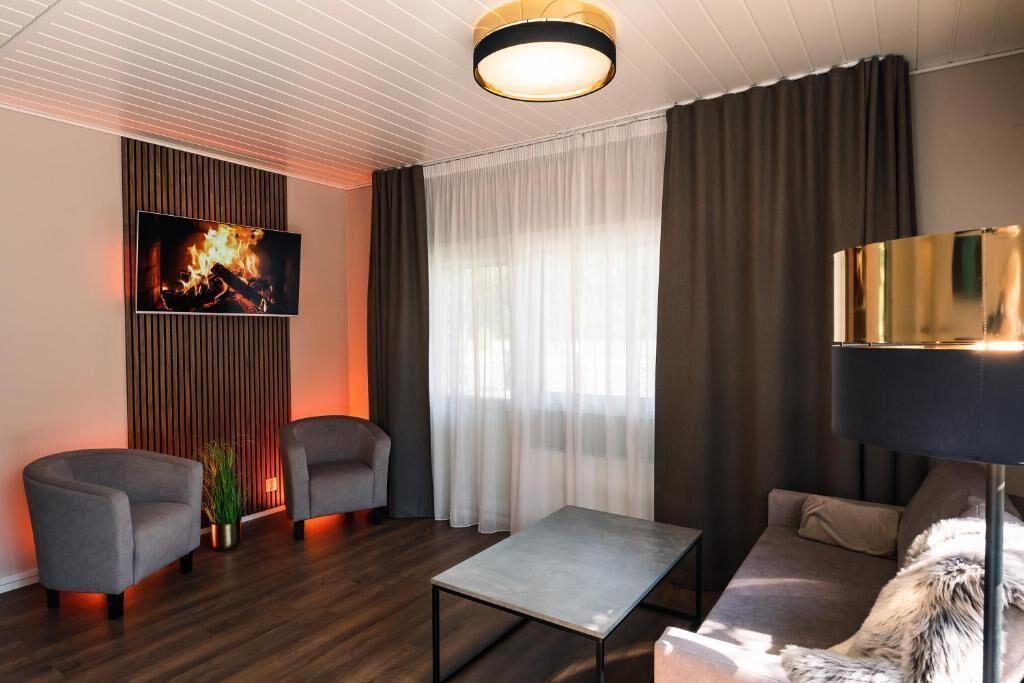 Suite, kitchenette, uitzicht op stad | Woonruimte