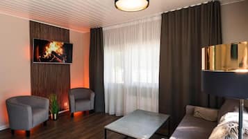 Suite, kitchenette, uitzicht op stad | Woonruimte