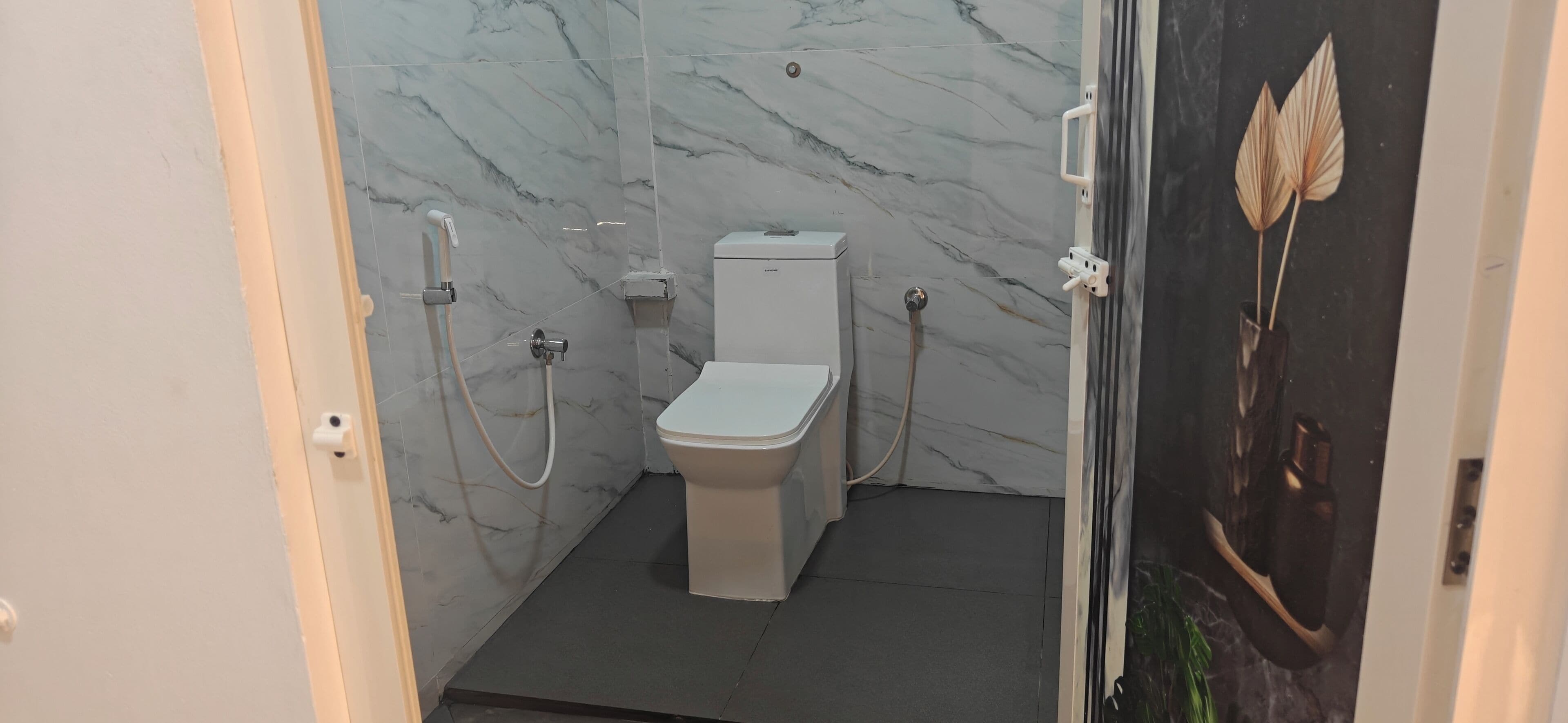 Separate bathtub and shower, towels, soap, shampoo
