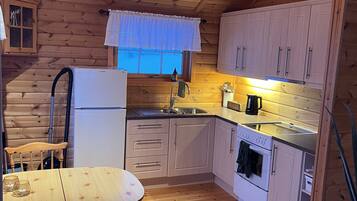 Fridge, oven, electric kettle, cookware/dishes/utensils