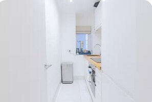 Private kitchen - Chic 1 bedroom flat in Cadogan Square with terrace (London)