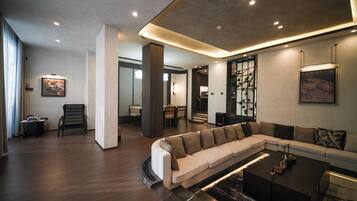 Deluxe Quadruple Room, Multiple Beds | Free minibar, iron/ironing board, free WiFi, bed sheets