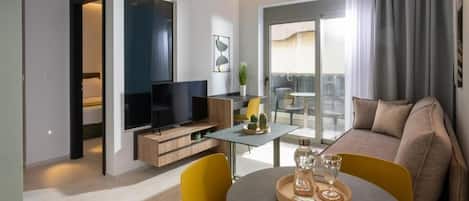 Premium Apartment, Balcony, City View | Living area | 40-inch Smart TV with digital channels