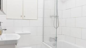 Combined shower/bathtub, deep-soaking bathtub, hair dryer