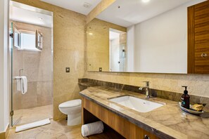Shower, hair dryer, towels - Sleek 9th-floor condo with wraparound balcony, ocean views & pool (Puerto Vallarta)