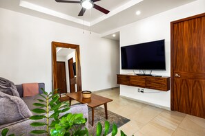 TV - 5th-floor condo with partial ocean views, heated pool, sauna, gym, balcony, W/D (Puerto Vallarta)