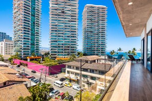 Property grounds - 5th-floor condo with partial ocean views, heated pool, sauna, gym, balcony, W/D (Puerto Vallarta)