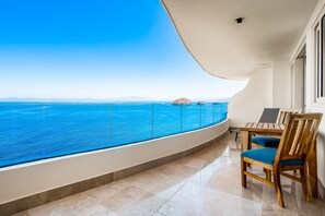 Terrace/patio - Oceanfront condo with rooftop infinity pool, panoramic views, balcony, gym, & AC (Puerto Vallarta)
