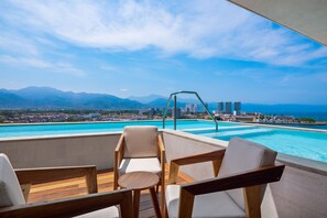 A heated pool - Resort condo with balcony, views, rooftop pool, gym, & full kitchen (Puerto Vallarta)
