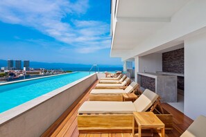 A heated pool - Resort condo with balcony, views, rooftop pool, gym, & full kitchen (Puerto Vallarta)