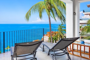 Property grounds - Bright ocean-view 2-story condo near beach with pool, balcony & full kitchen (Puerto Vallarta)