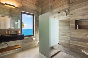 Shower, hair dryer, towels - Bright ocean-view 2-story condo near beach with pool, balcony & full kitchen (Puerto Vallarta)