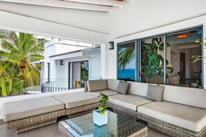 Terrace/patio - Bright ocean-view 2-story condo near beach with pool, balcony & full kitchen (Puerto Vallarta)
