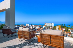 Terrace/patio - Luxury condo with shared rooftop pool and lounge, private washer/dryer (Puerto Vallarta)