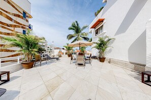 Terrace/patio - Central Puerto Vallarta condo with pool, ocean views & fast WiFI - walk to beach (Puerto Vallarta)
