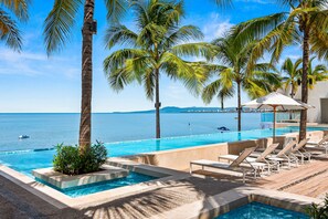 Pool - Stylish oceanfront condo with infinity pool, rooftop deck & beach access (Puerto Vallarta)