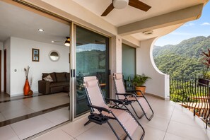 Terrace/patio - Mismaloya Beach condo with ocean views, on-site pool, grill, & private balcony (Puerto Vallarta)