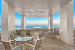 Outdoor dining - Oceanfront studio with infinity pool, breathtaking views & beach access (Puerto Vallarta)